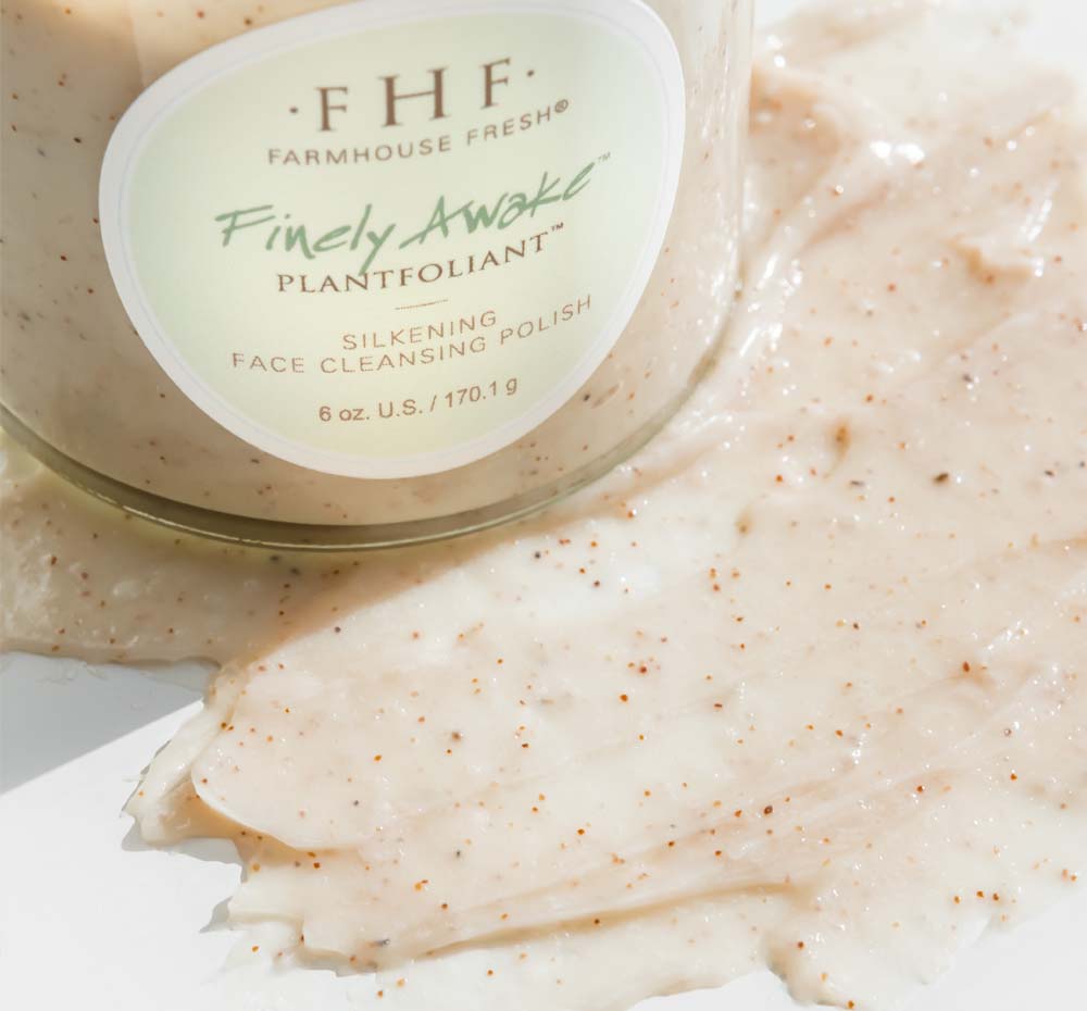 A jar and texture smear of Finely Awake face scrub.
